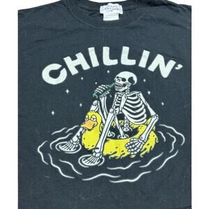 Urban Nation Chillin' Halloween Graphic Cropped t-shirt skeleton relaxing
